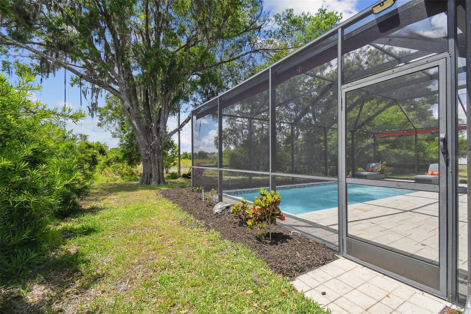 Exterior screened door