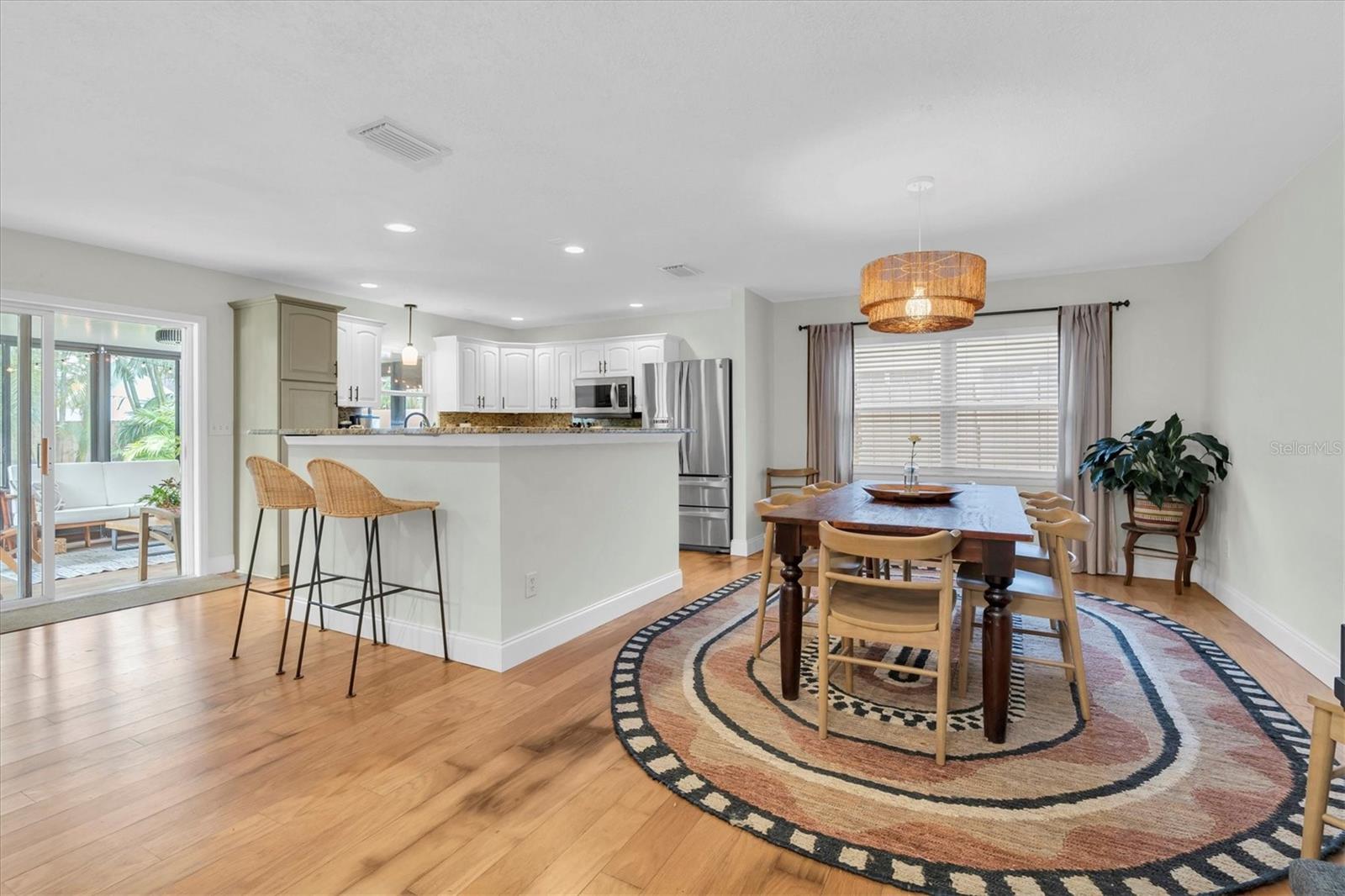 Dining to Kitchen to Bonus Room on left