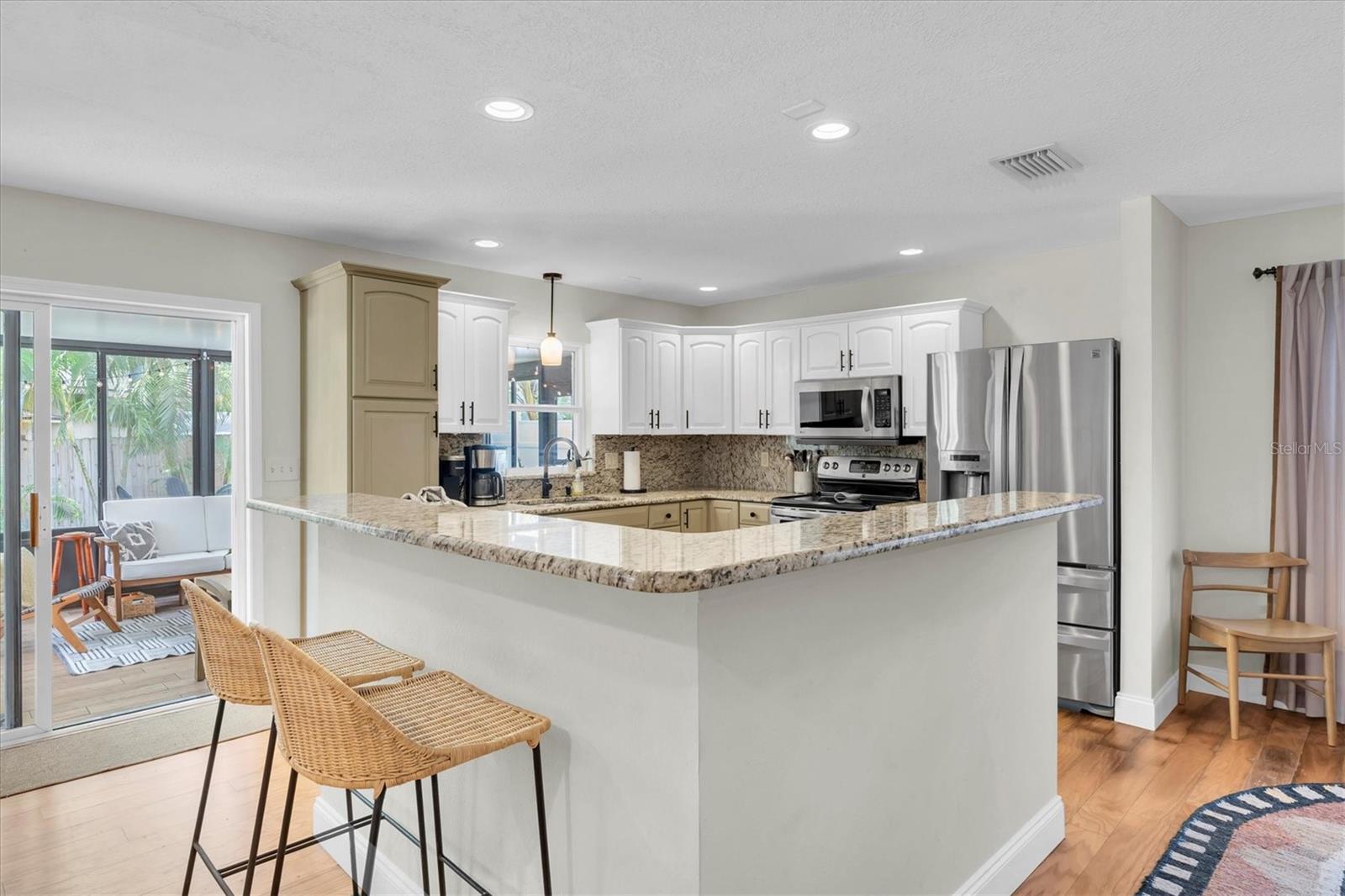 Kitchen looking to Bonus Room on left