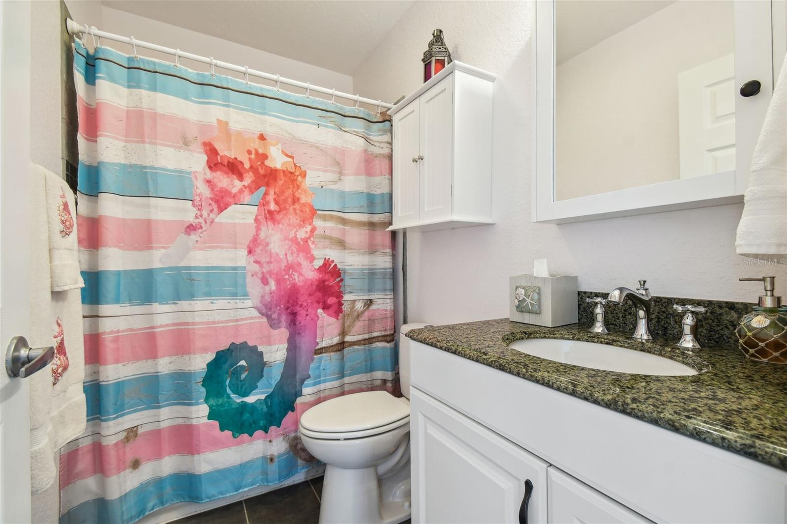 Guest bathroom at the end of the hallway