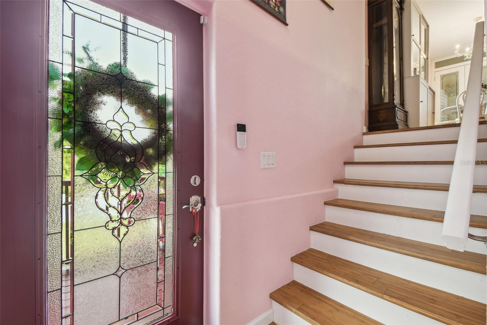 Stairs from the front door leading up to the living area