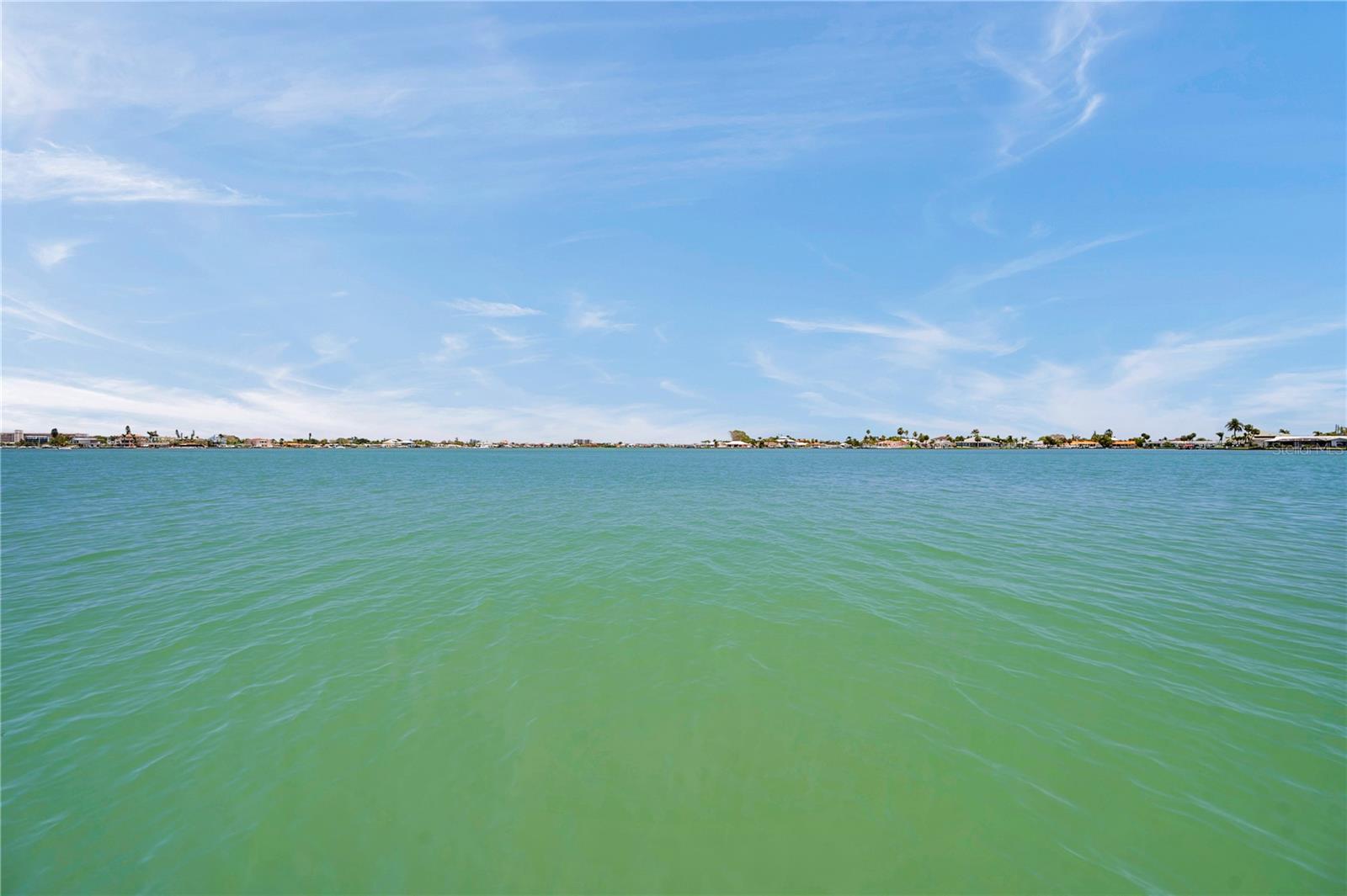 This is no canal lot - here you have wide open water views across Boca Ciega Bay.