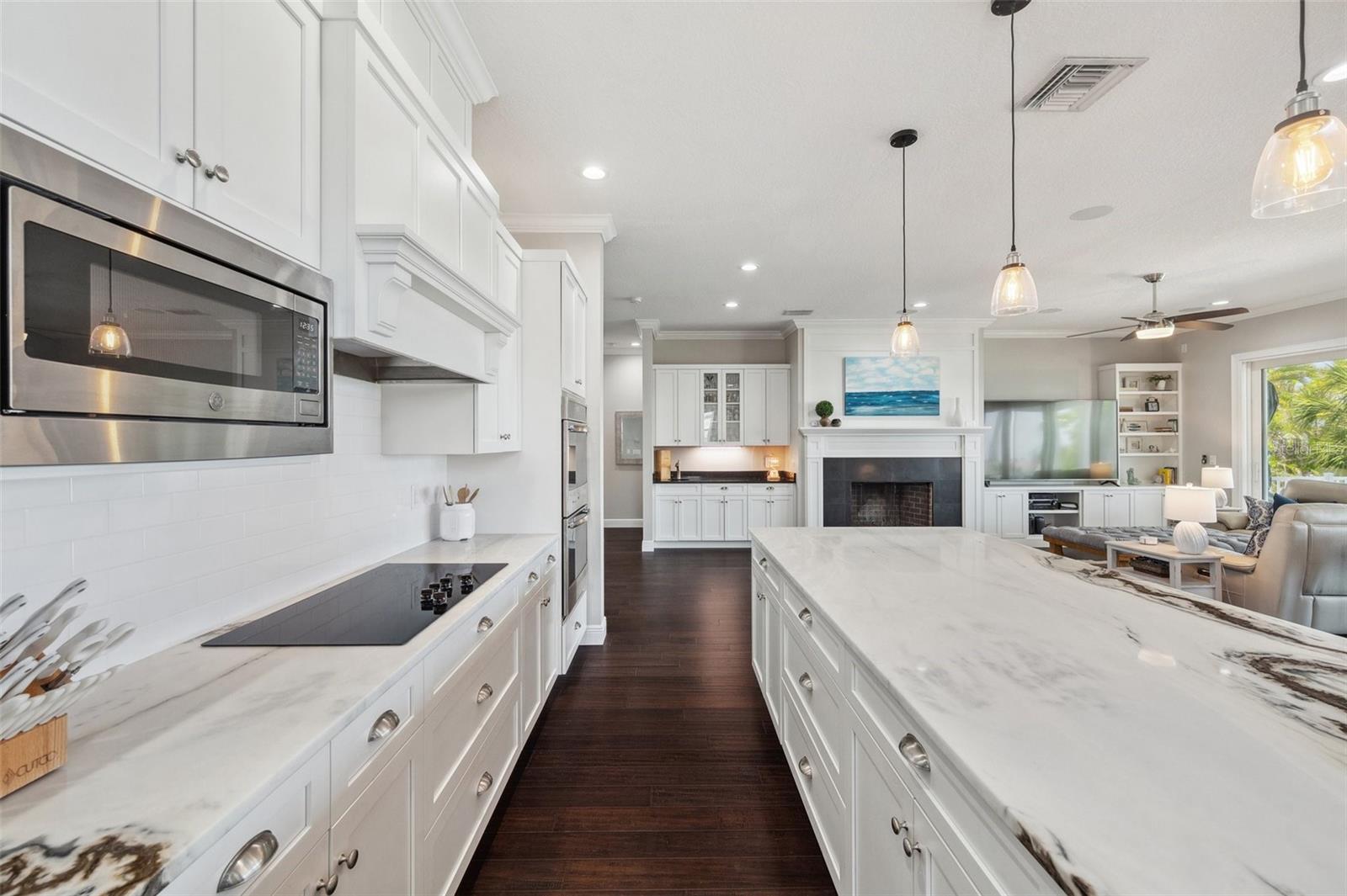 Lots of beautiful stone countertops to make meal prep and entertaining a breeze.