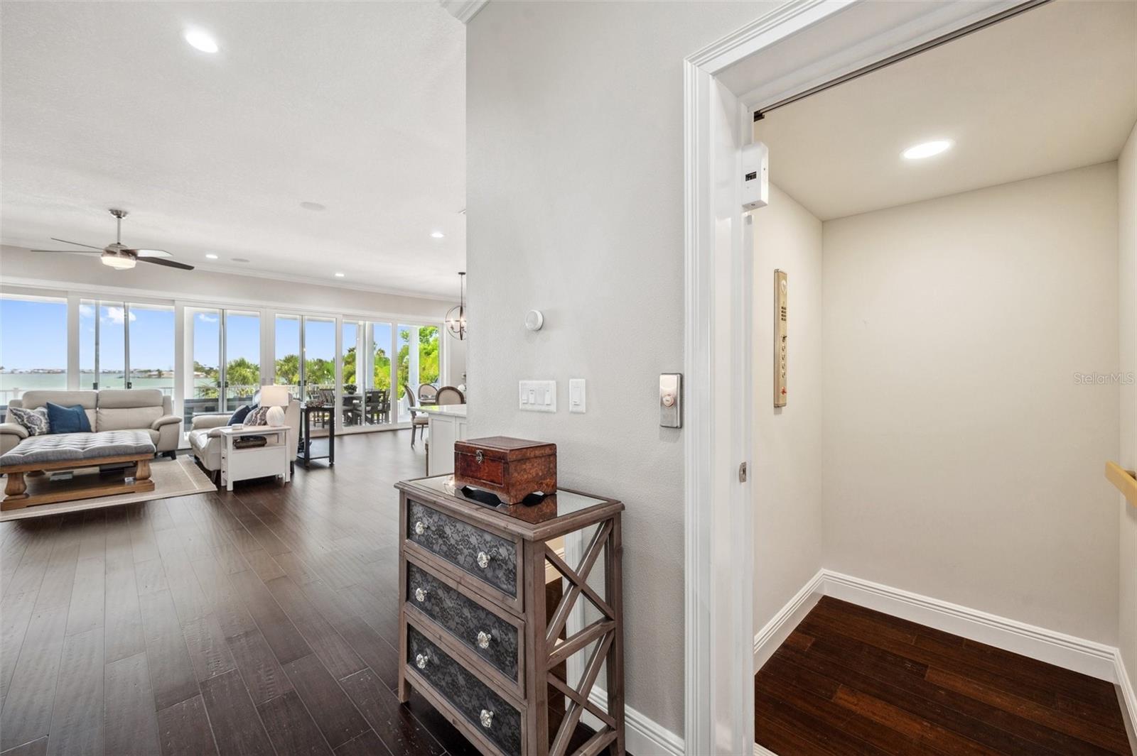 View of 2nd floor living space and elevator (right).