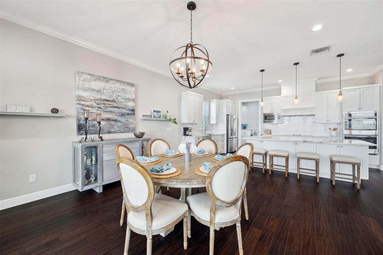 View of dining area and kitchen.