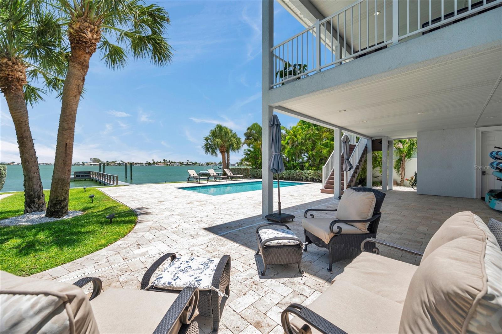 Large pool deck with ample room for seating - either under the shade of the lanai, or full sun.