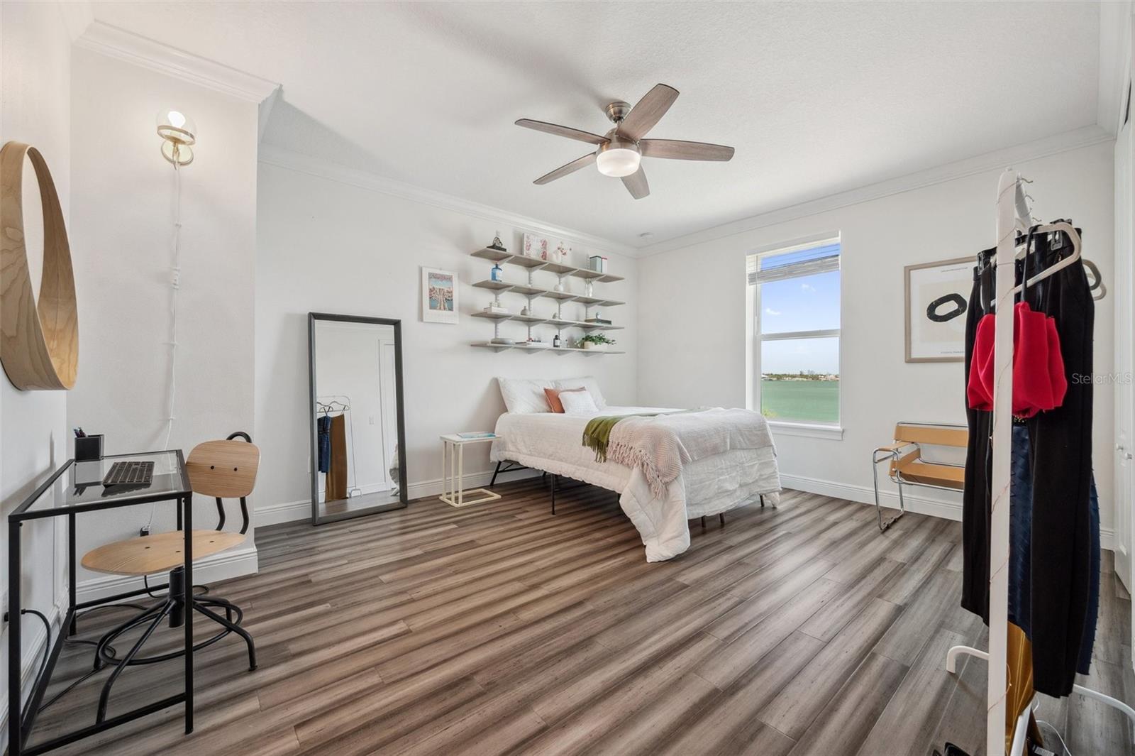 This secondary master bedroom is located on the 3rd floor and features a water view.