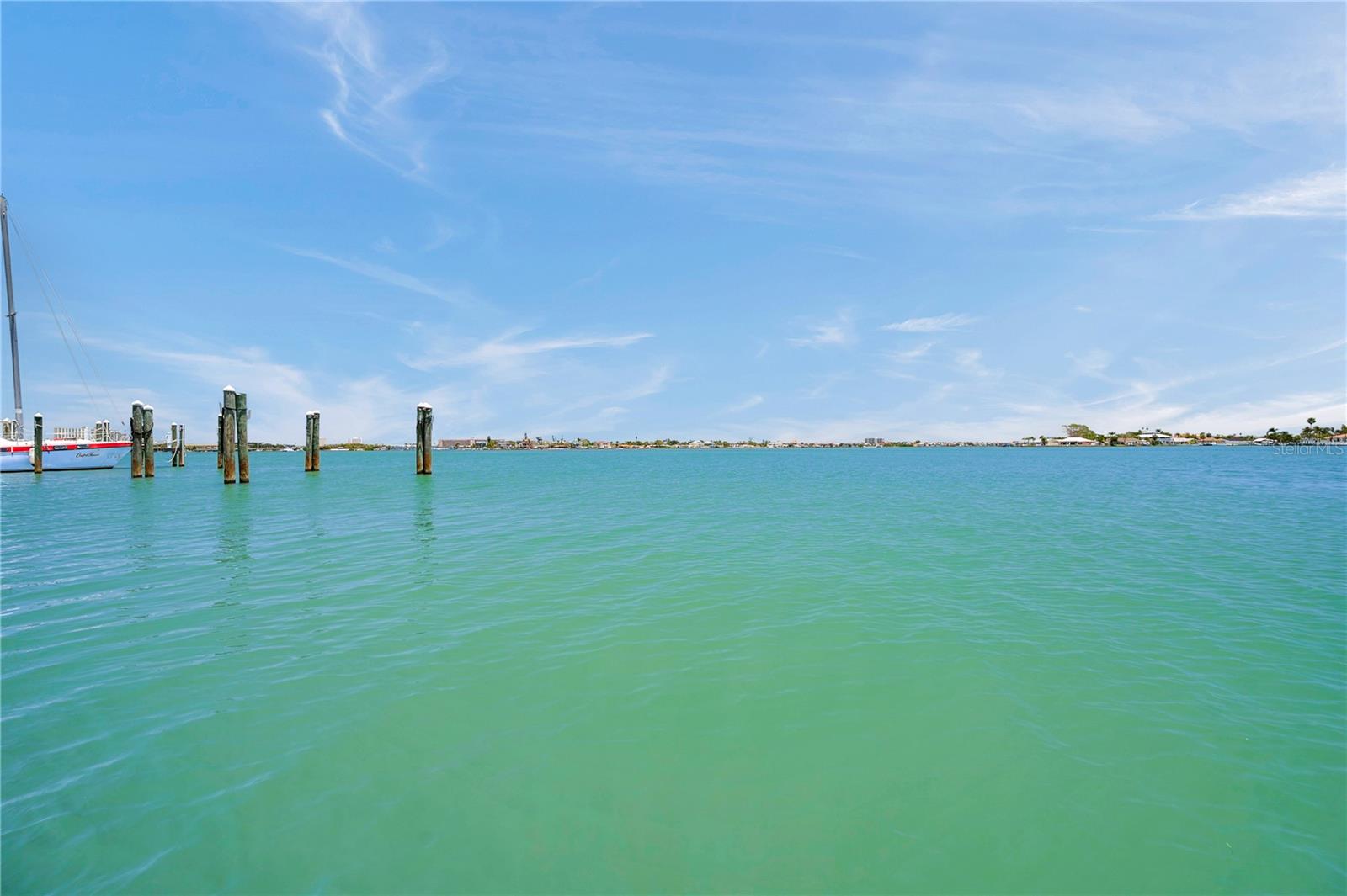 This is no canal lot! Enjoy wide open water views across Boca Ciega Bay.