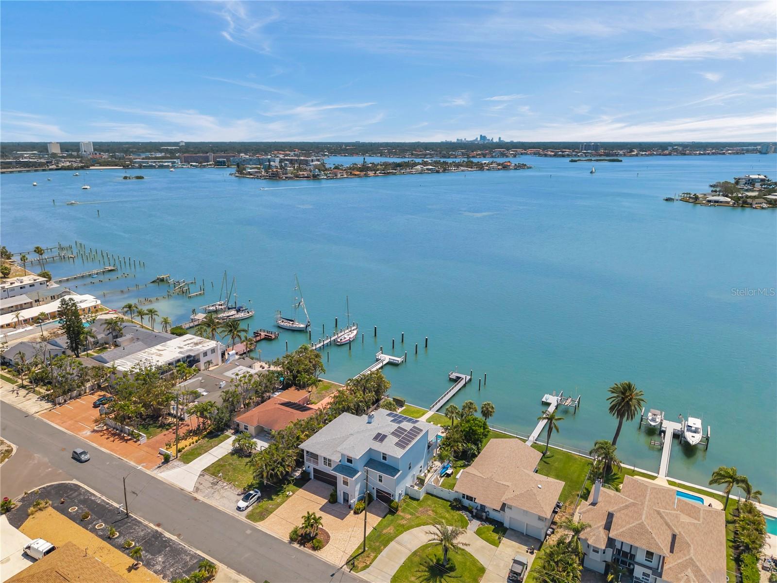 Aerial view showcasing the neighborhood of this luxury waterfront home.