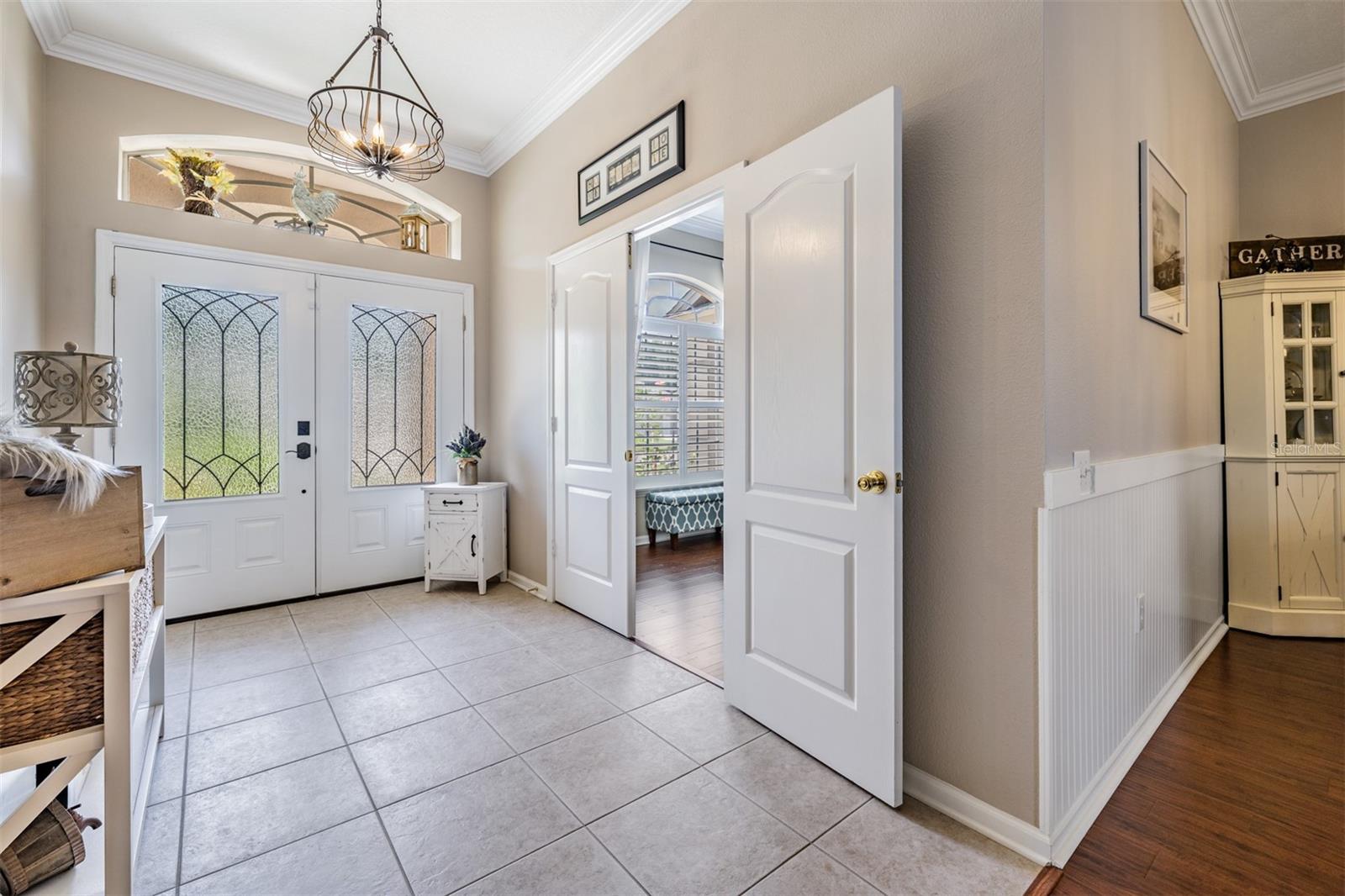 Large foyer with entrance to Den