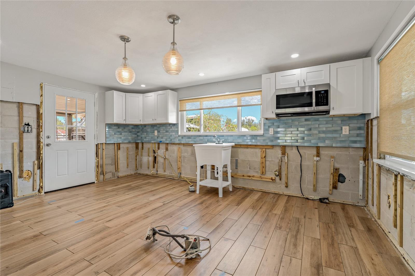 Kitchen - Window provides view of back yard, canal and boatlift