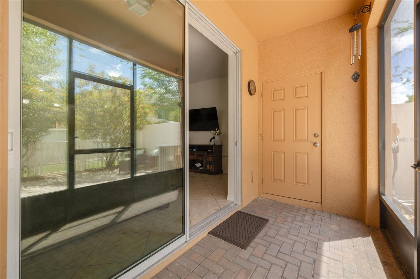 Screened Patio with storage closet