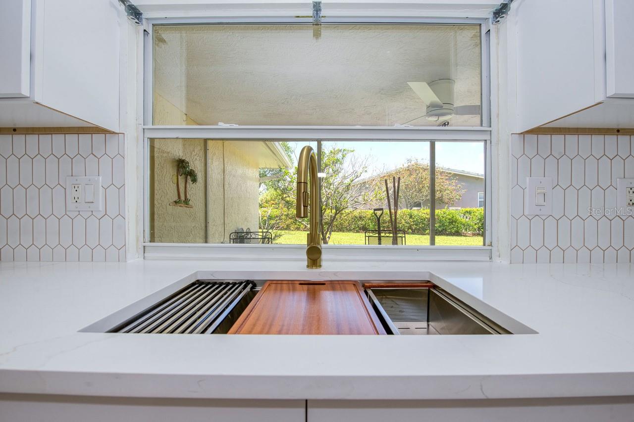 Kitchen View To Patio and Yard