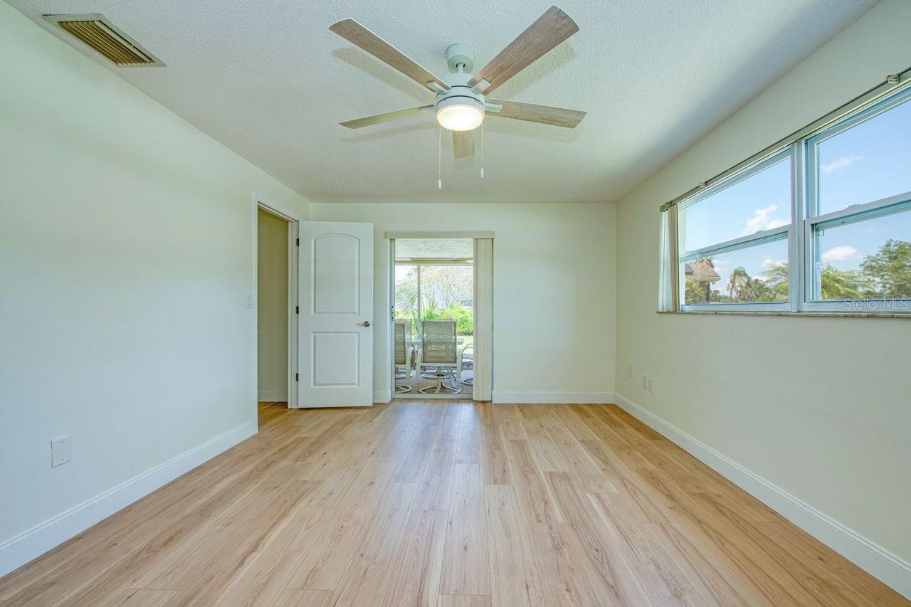 Primary Bedroom - Opens to Screened Patio