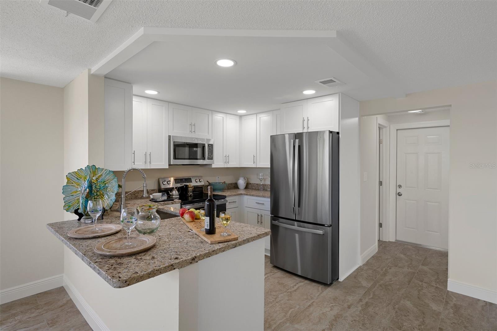 Door to Garage access and laundry room