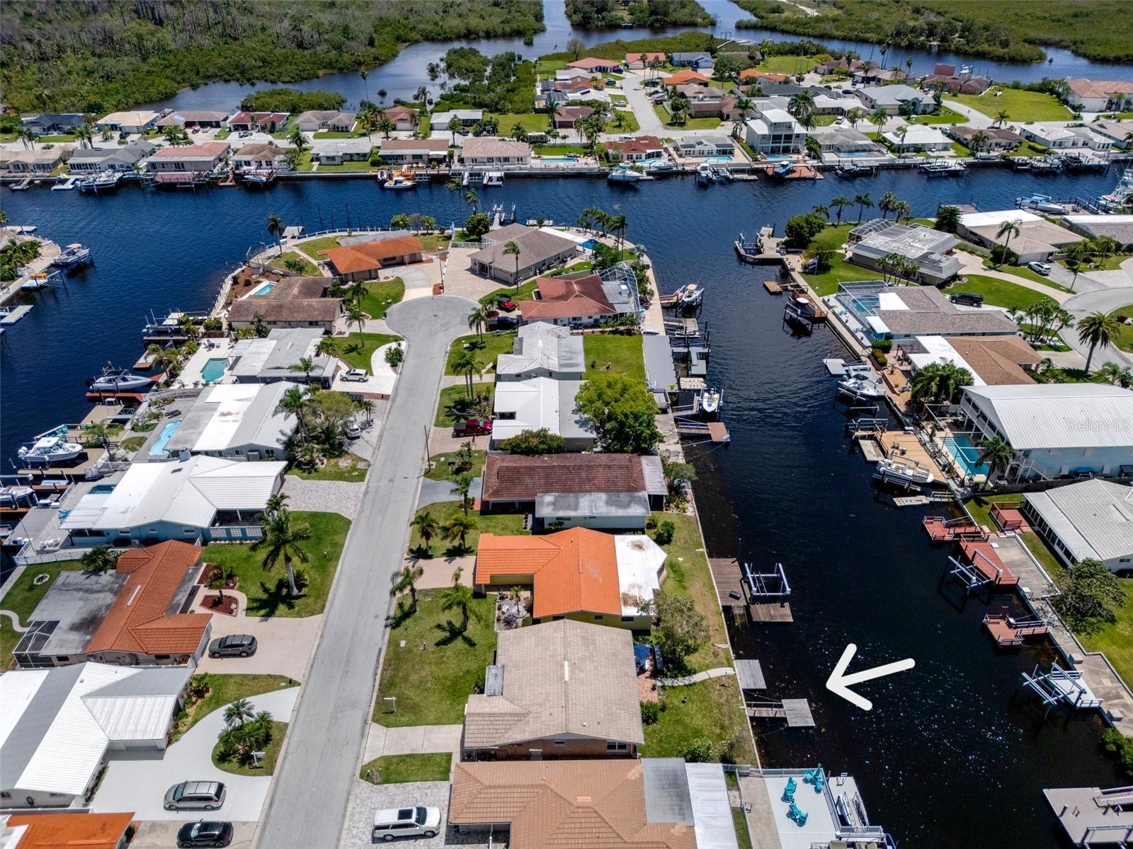 Plenty of room to add boat lift or expand the deck - check with Pasco county permits dept - on how far out can you build a deck over the water.  Beautiful Tile Roof - Cover the Florida Room as well.