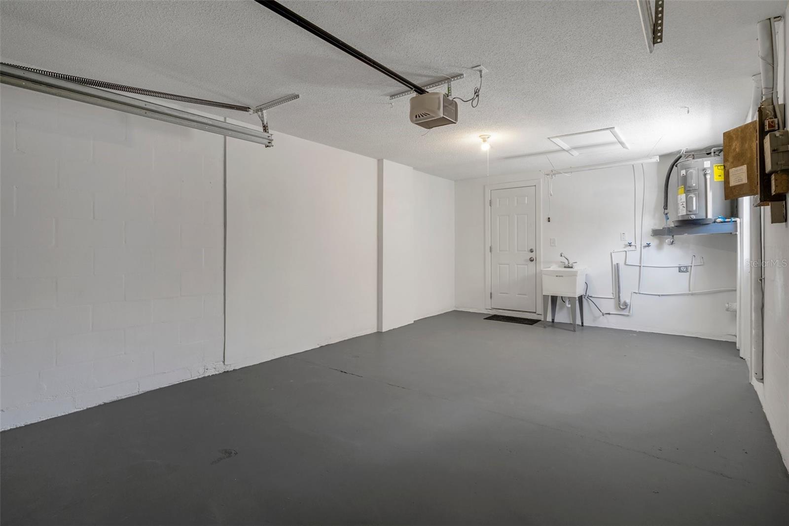 One Car Garage with laundry room, sink installed