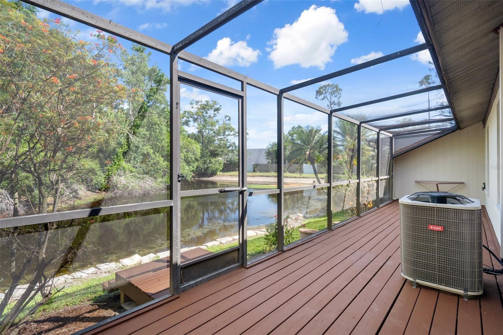 Rear Birdcage patio overlooking pond