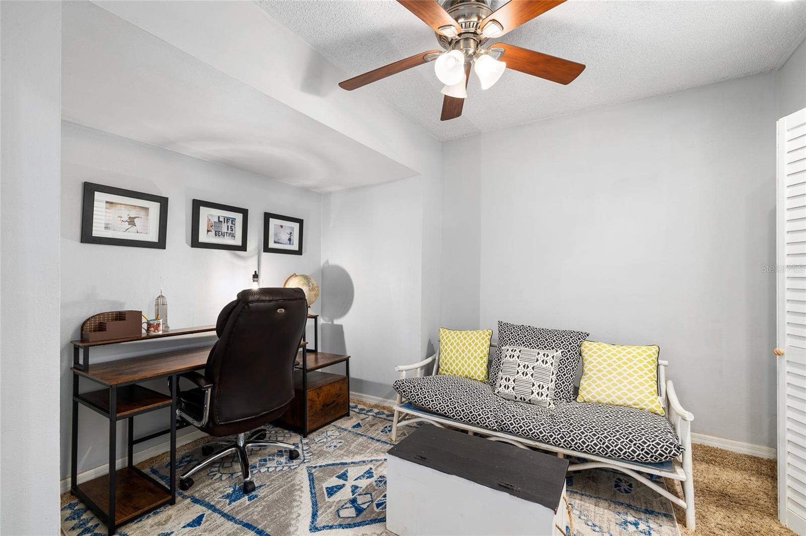 Previous owners converted the garage to an extra office/den space with indoor Landry area