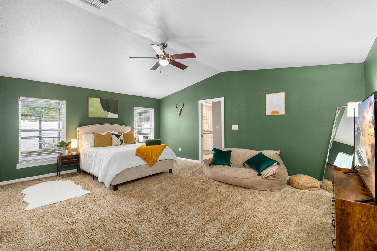 Massive Primary bedroom with vaulted ceiling