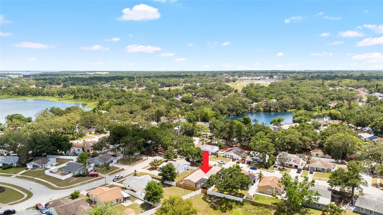Home is nestled into this beautiful neighborhood with winding tree lined streets