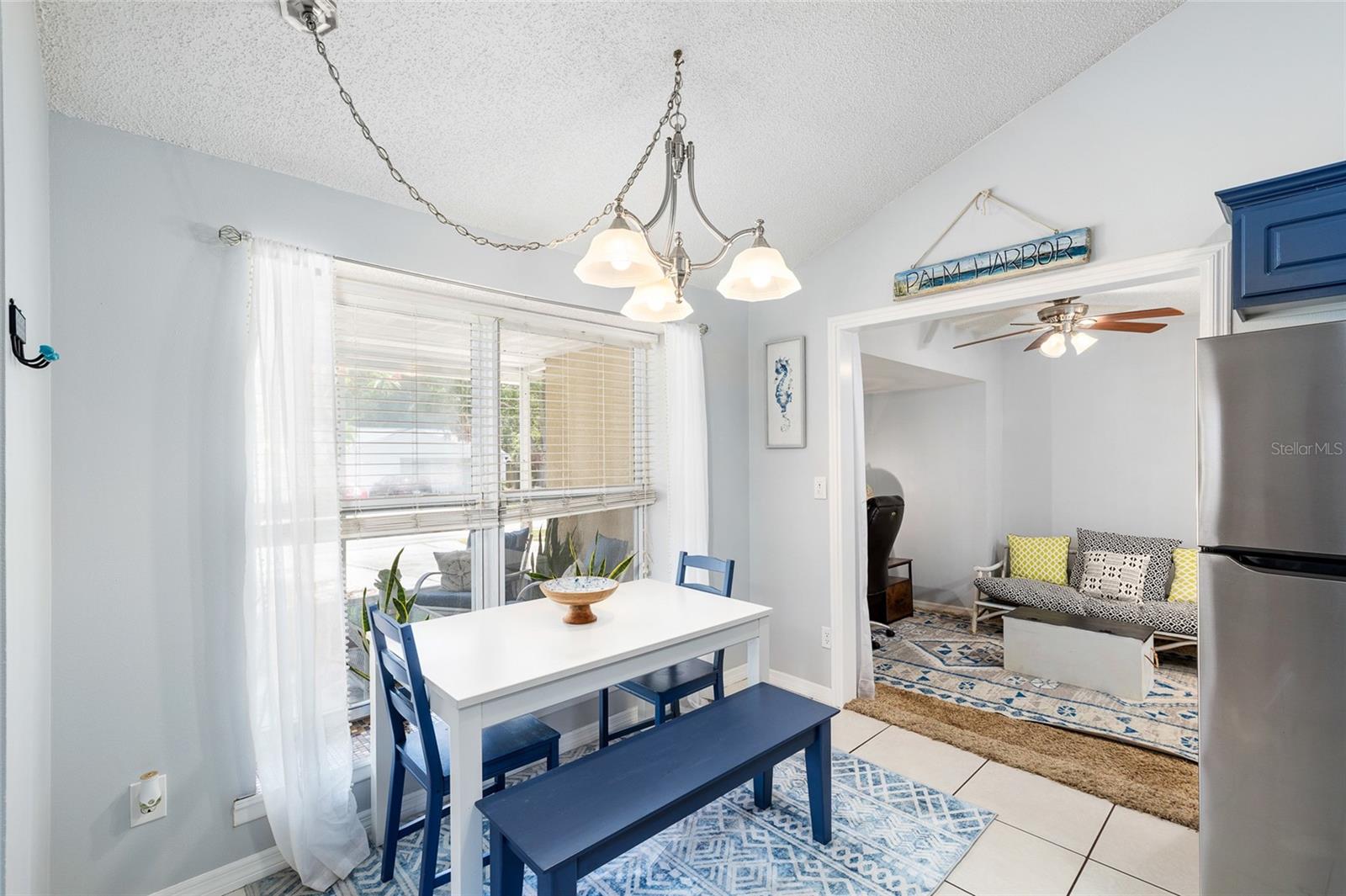 Cozy kitchen dining nook leads into the den/office space