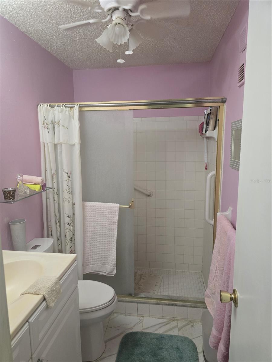 Main bathroom, tub and shower
