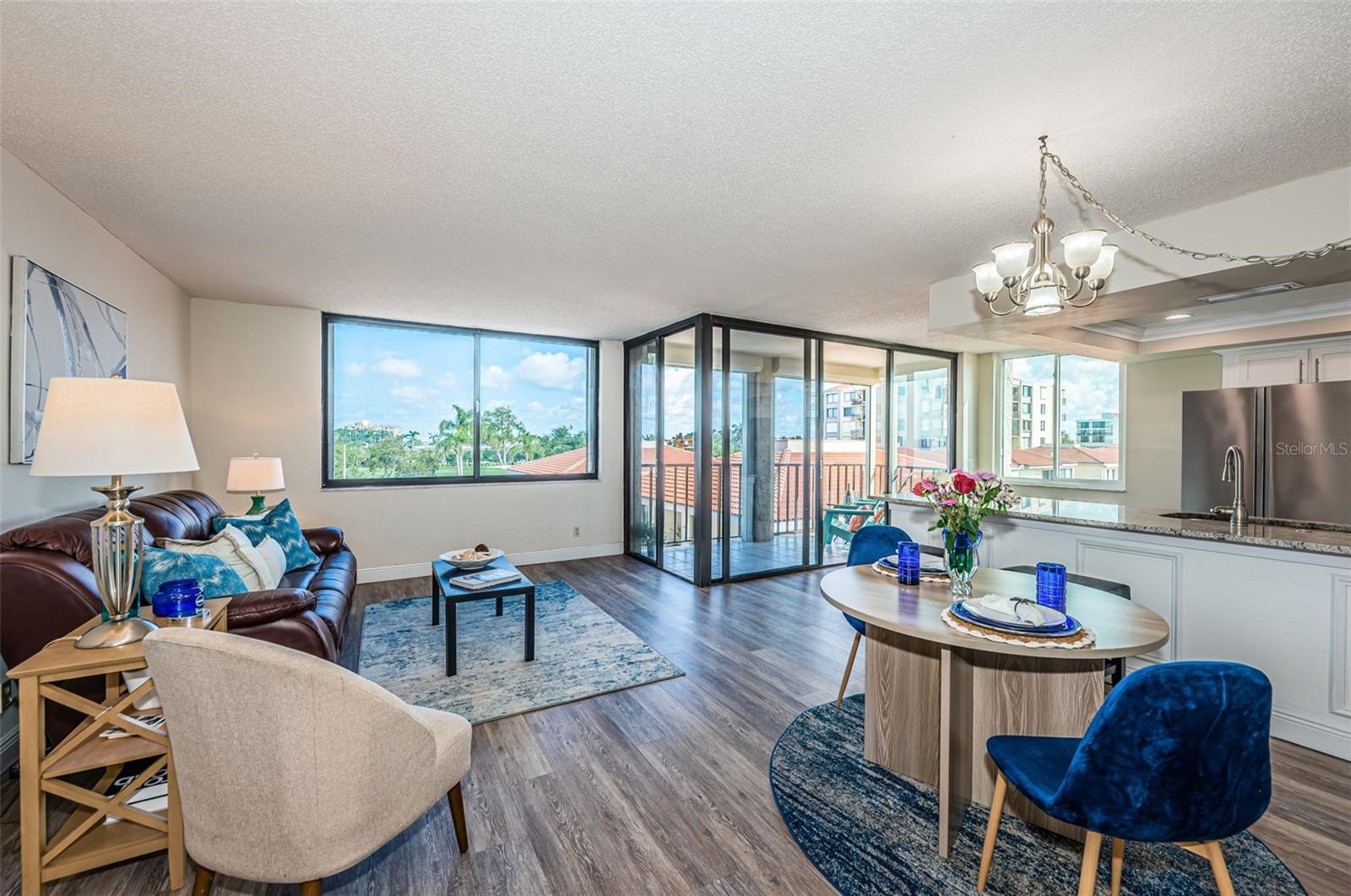 Spacious, airy living area with direct access to your extended private balcony.