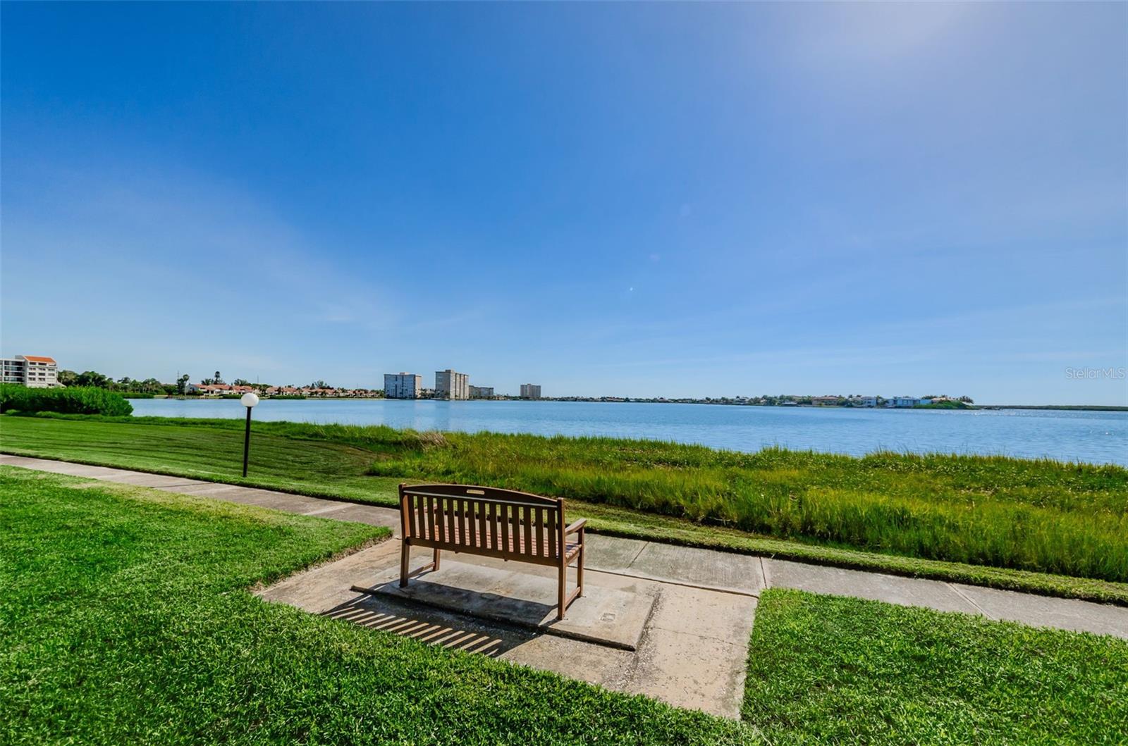 Bench outside condo.