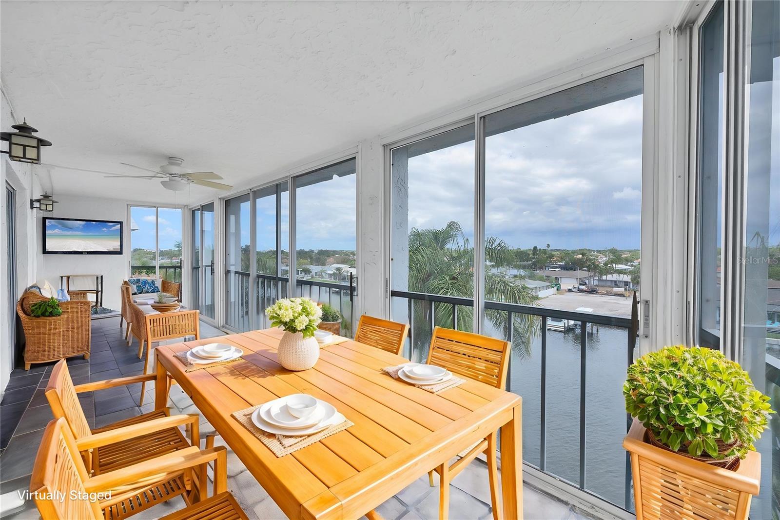 Plenty of space on your balcony to enjoy the views of the grand canal and marina