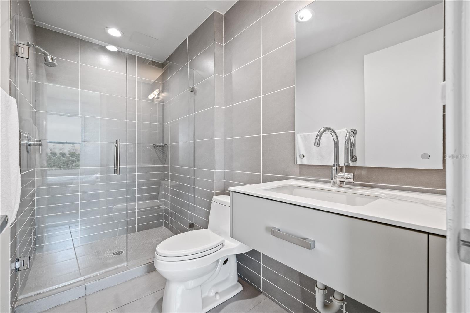 Step in shower in the second bedroom en-suite bathroom.