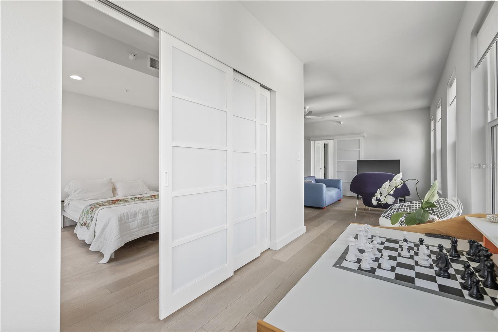 Sliding Shoji doors leading to the primary bedroom.