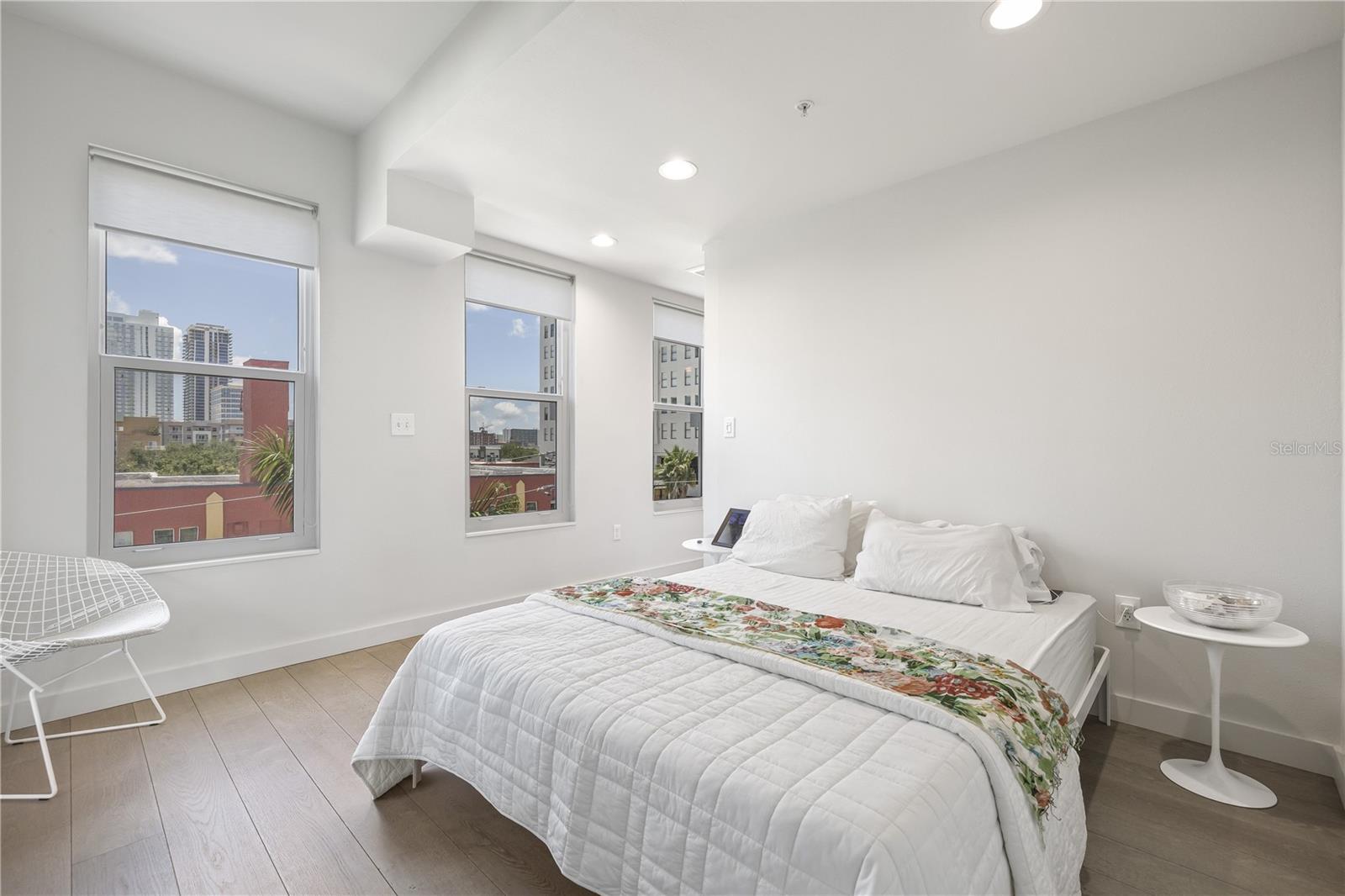Open and airy primary bedroom.