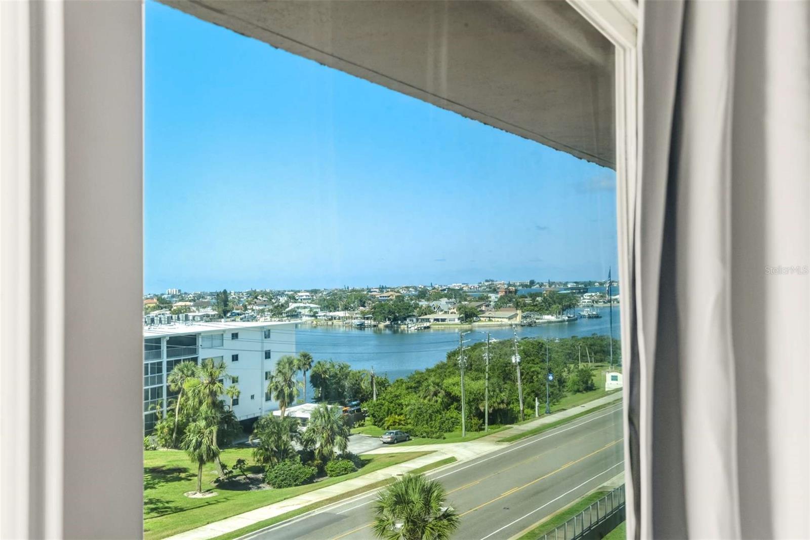 Southern water views from primary bedroom