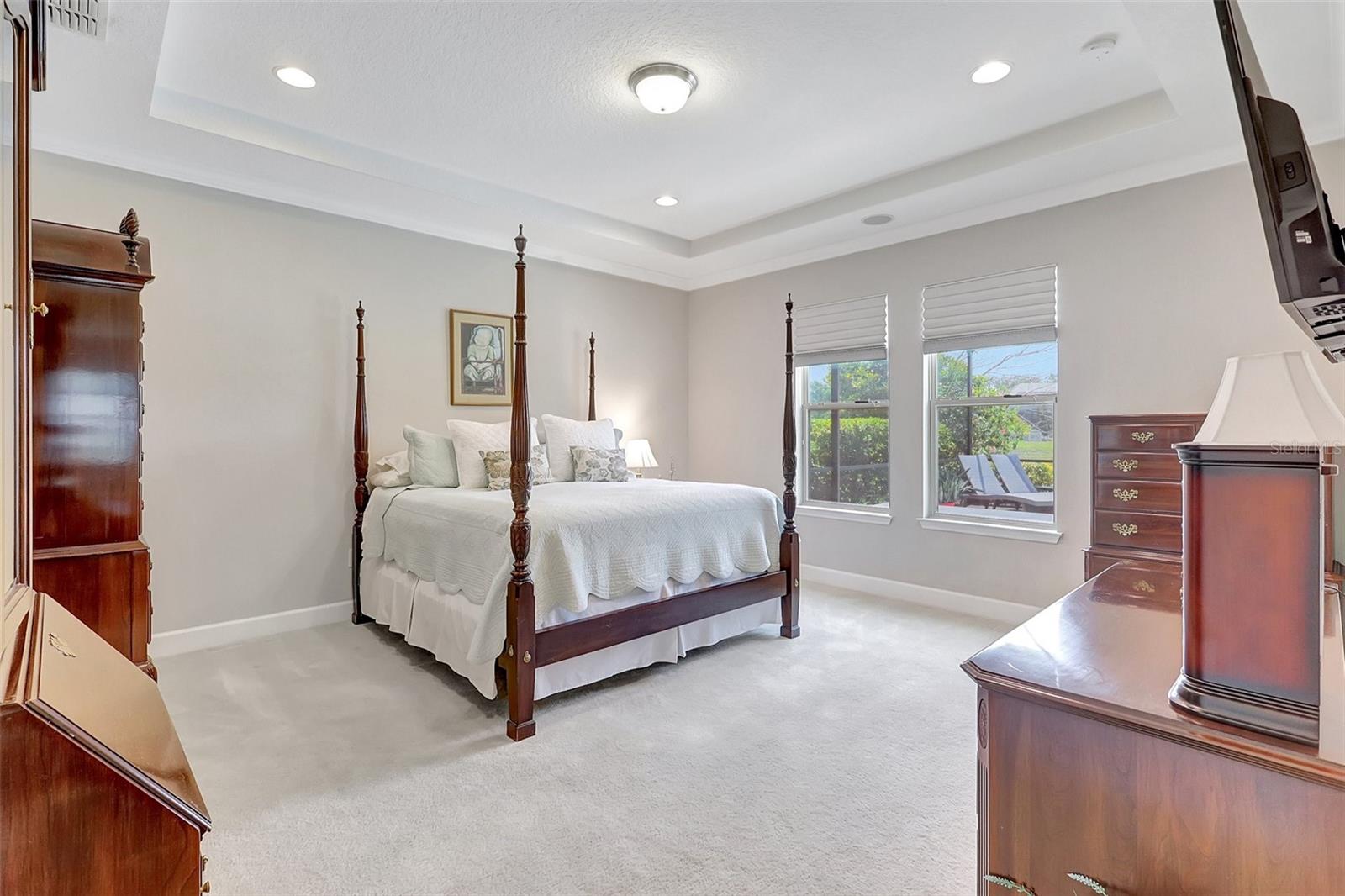 Primary Suite is Spacious and overlooks pond