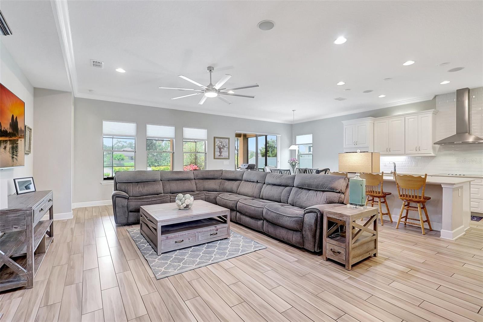 Large family room holds the biggest comfy couch