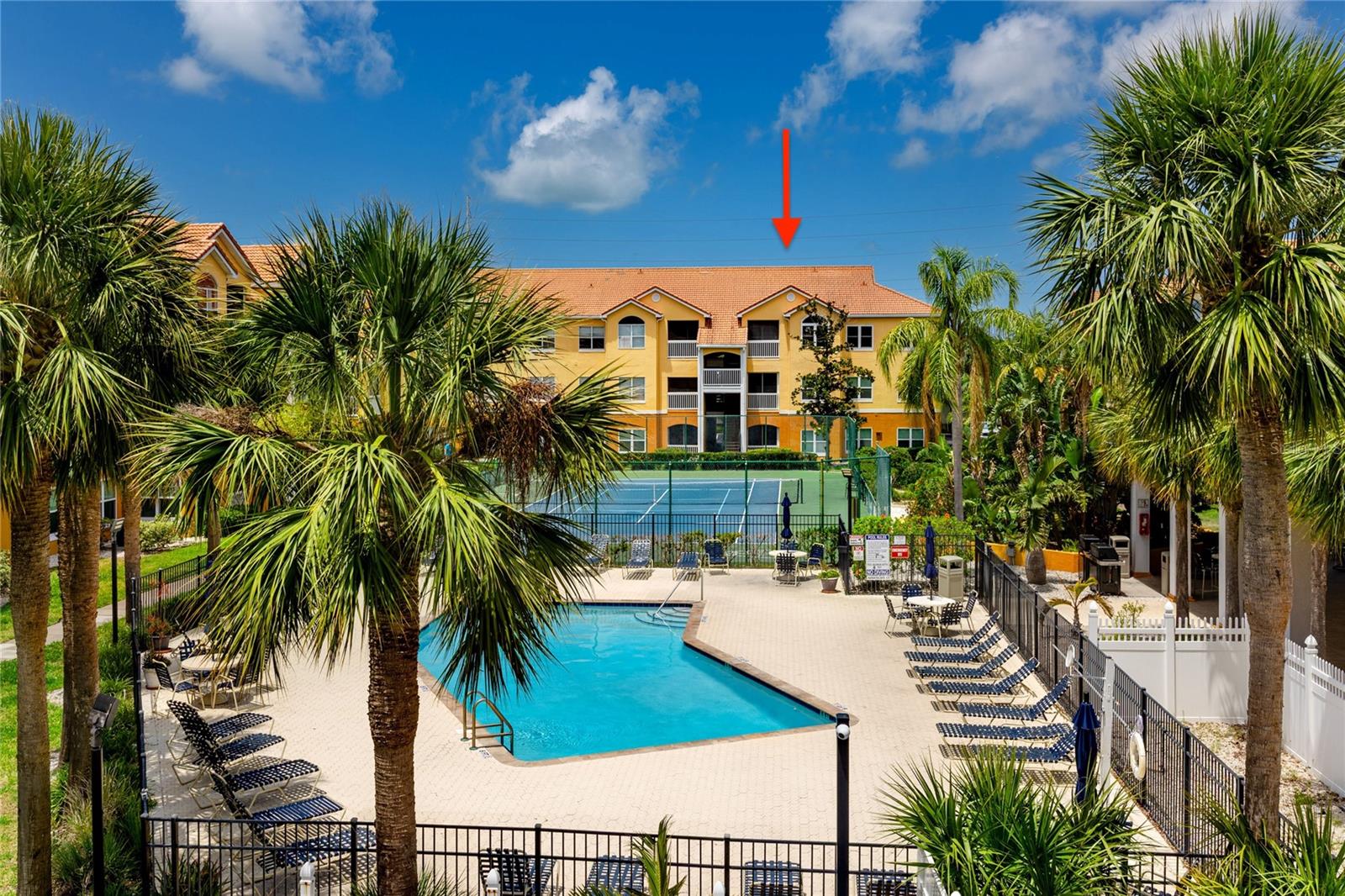 Rarely available top floor unit with courtyard views