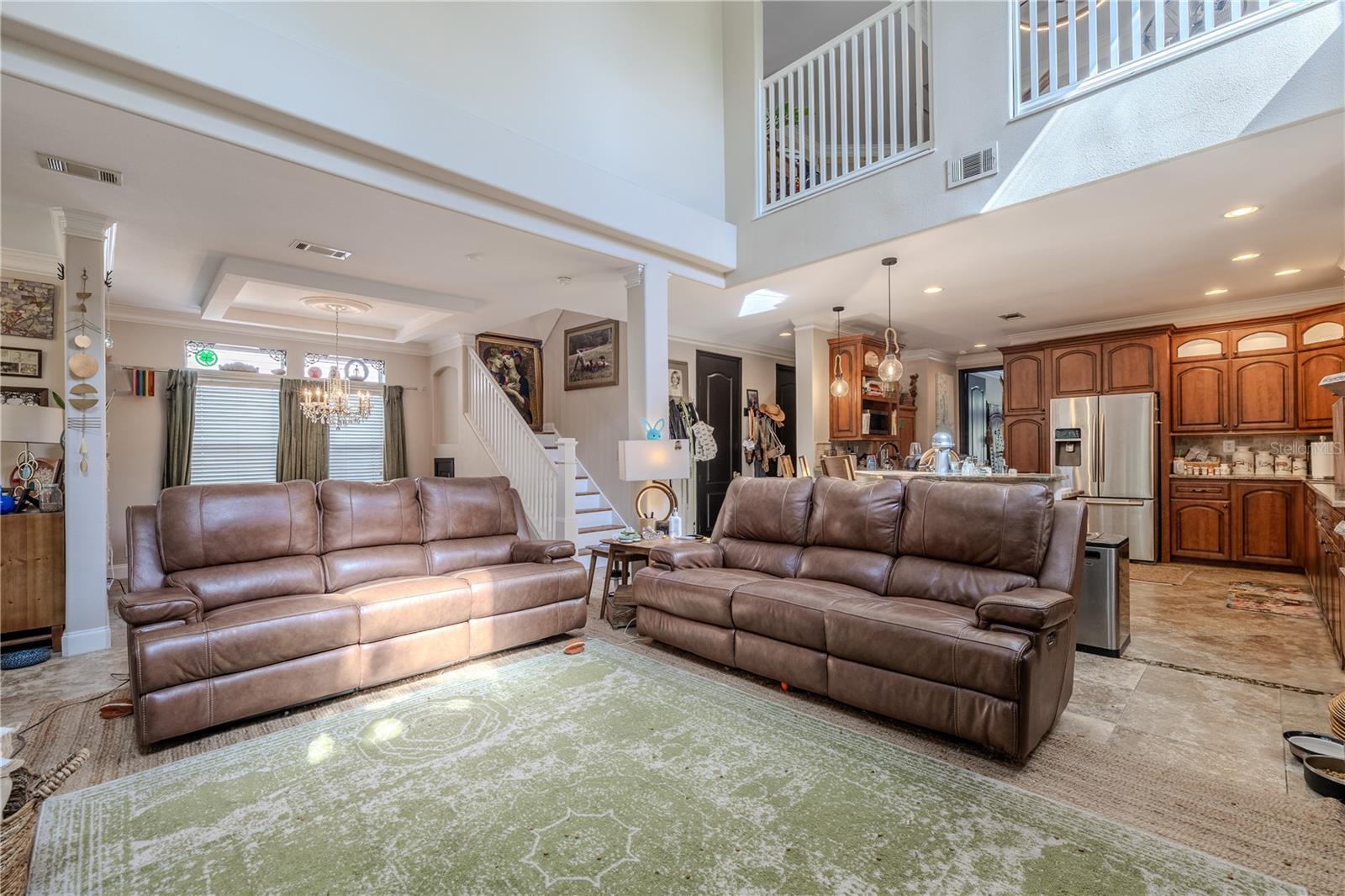 Living room is open to the dining room and kitchen.