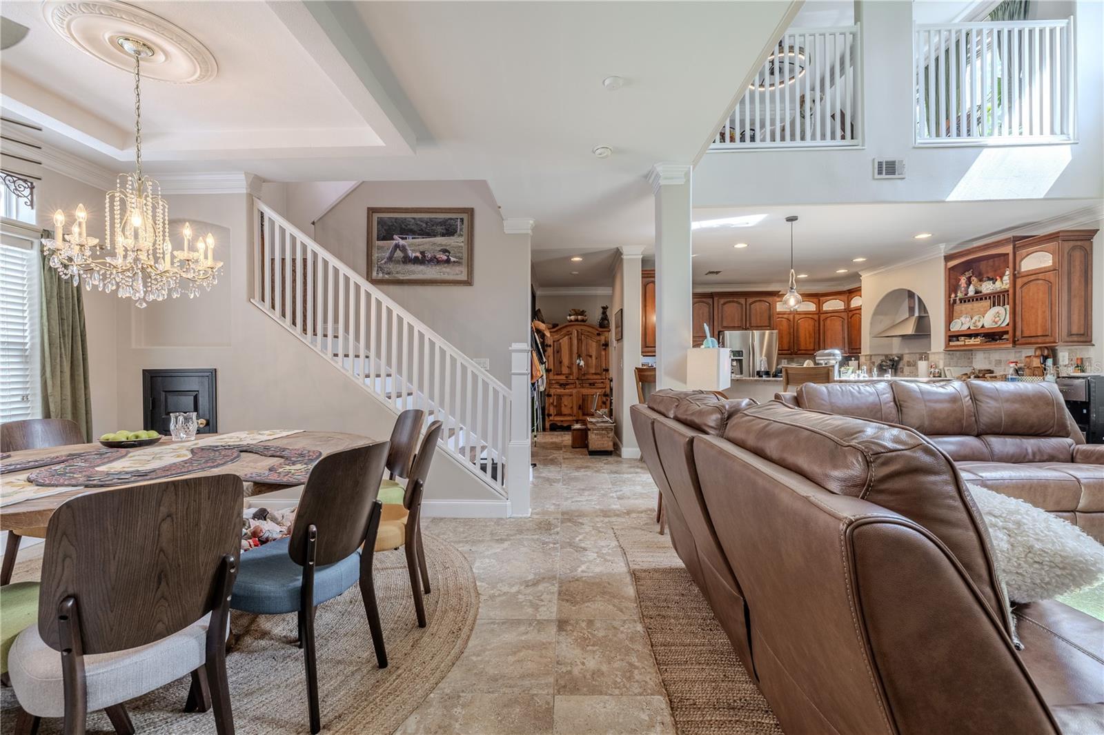 The open floor plan features soaring ceilings