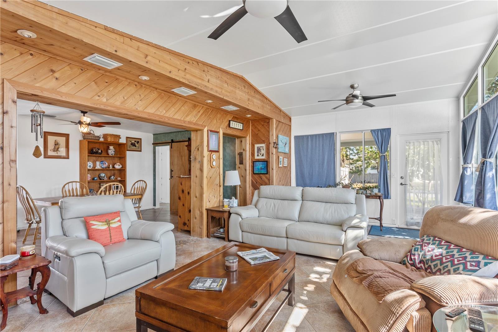 Large Living Area with door onto covered side patio.