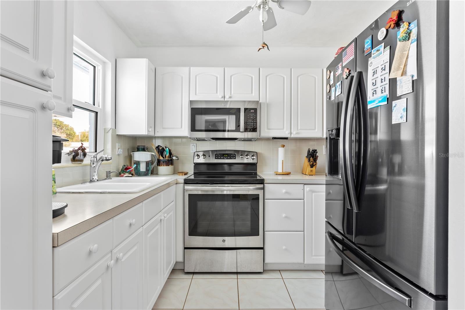 Compact and very utilitarian kitchen space now ...with....