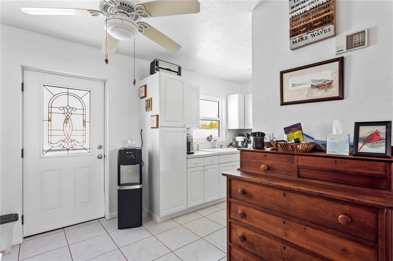 Door to the pool area - convenient to the kitchen for entertaining.