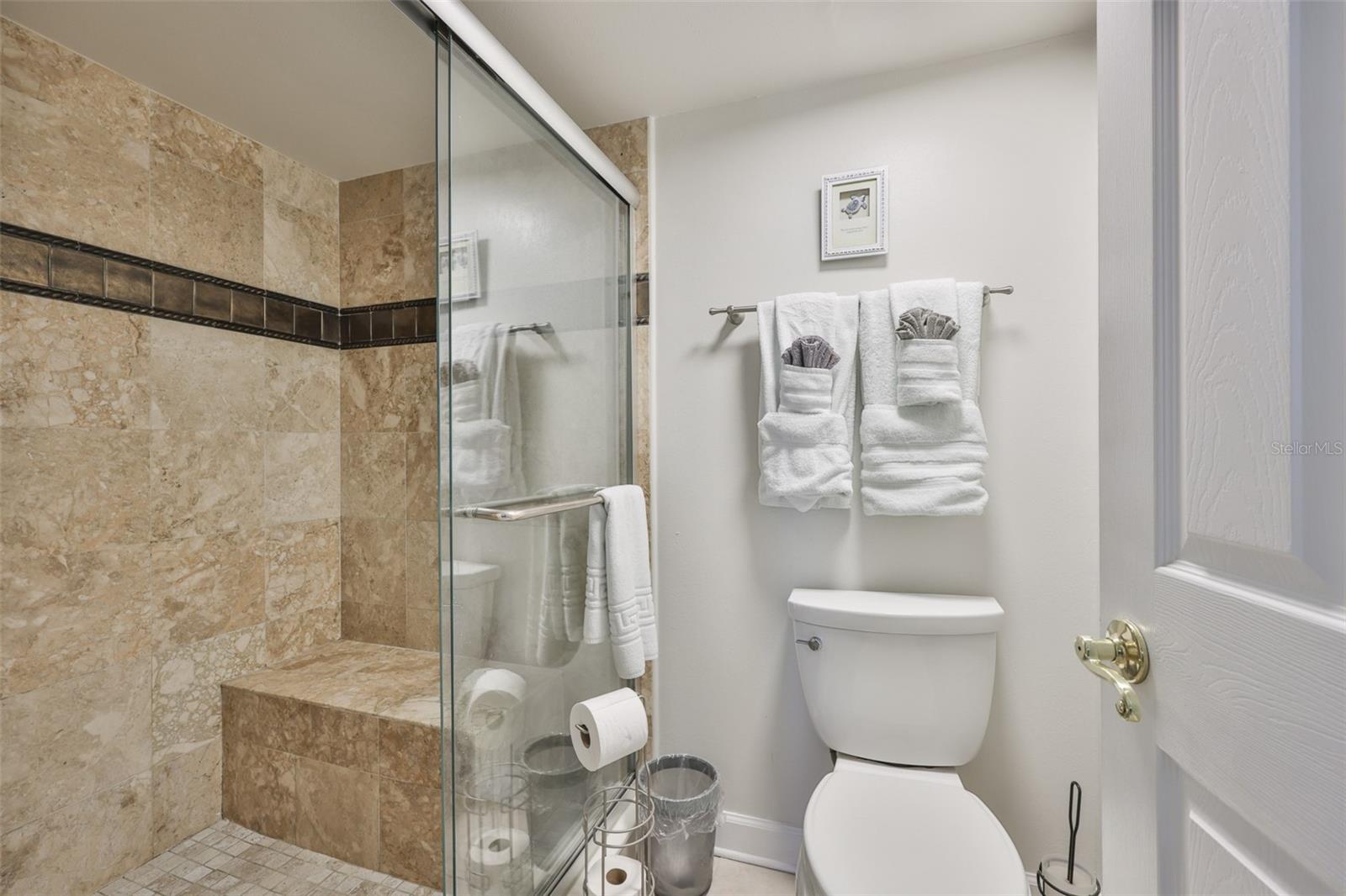 Primary Bathroom with Glass Enclosed Walk-In Shower