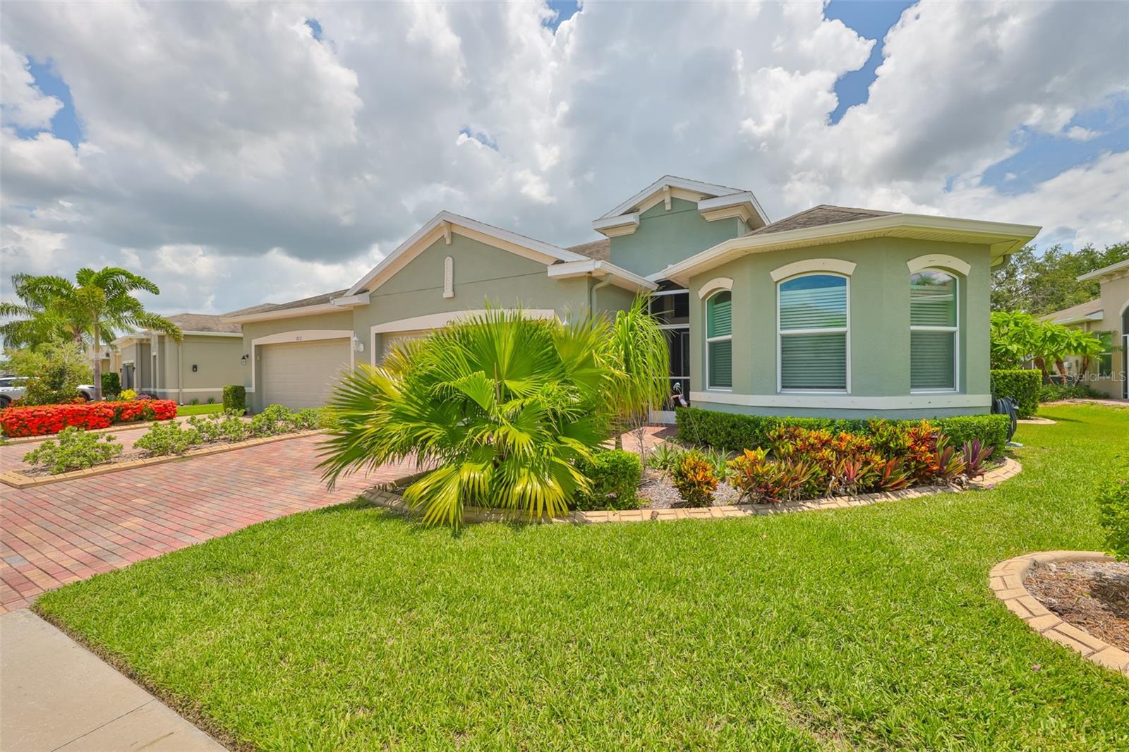 One of a kind villa!  Beautifully pavered, double driveway landscaped and ready for a new owner.