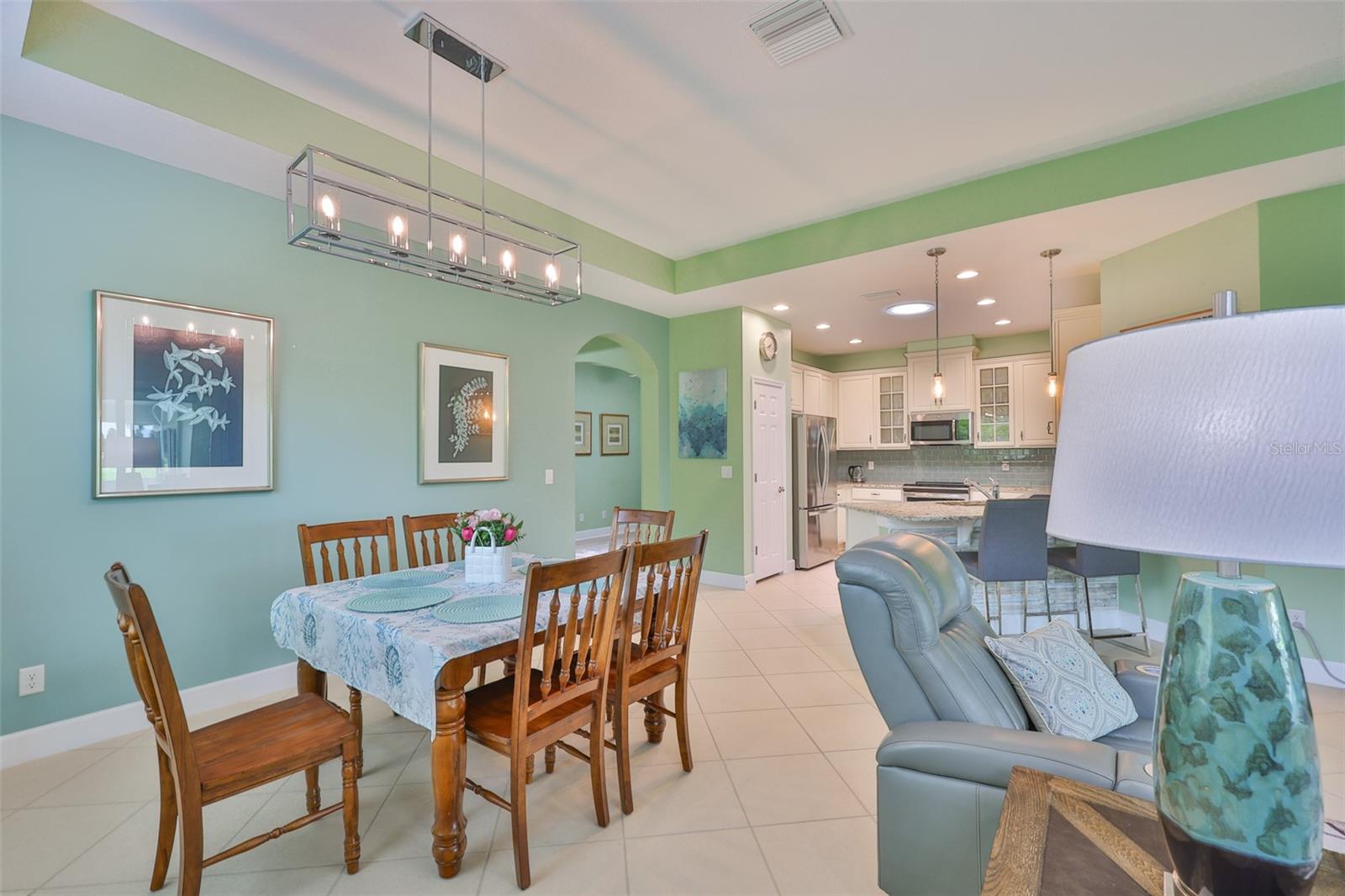 The dining room is spacious and part of the open floor plan.