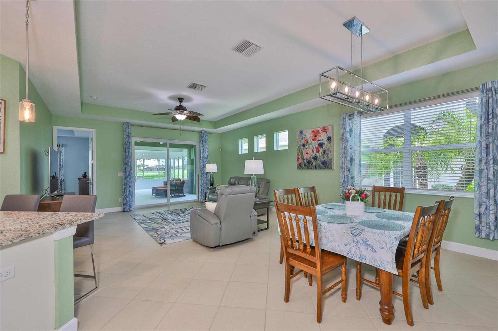 An open floor plan in this meticulously clean and modern villa makes this space feel incredibly large, with Mother Nature just outside your door.  REMEMBER ALL FURNITURE WILL CONVEY WITH THE SALE, IF DESIRED.