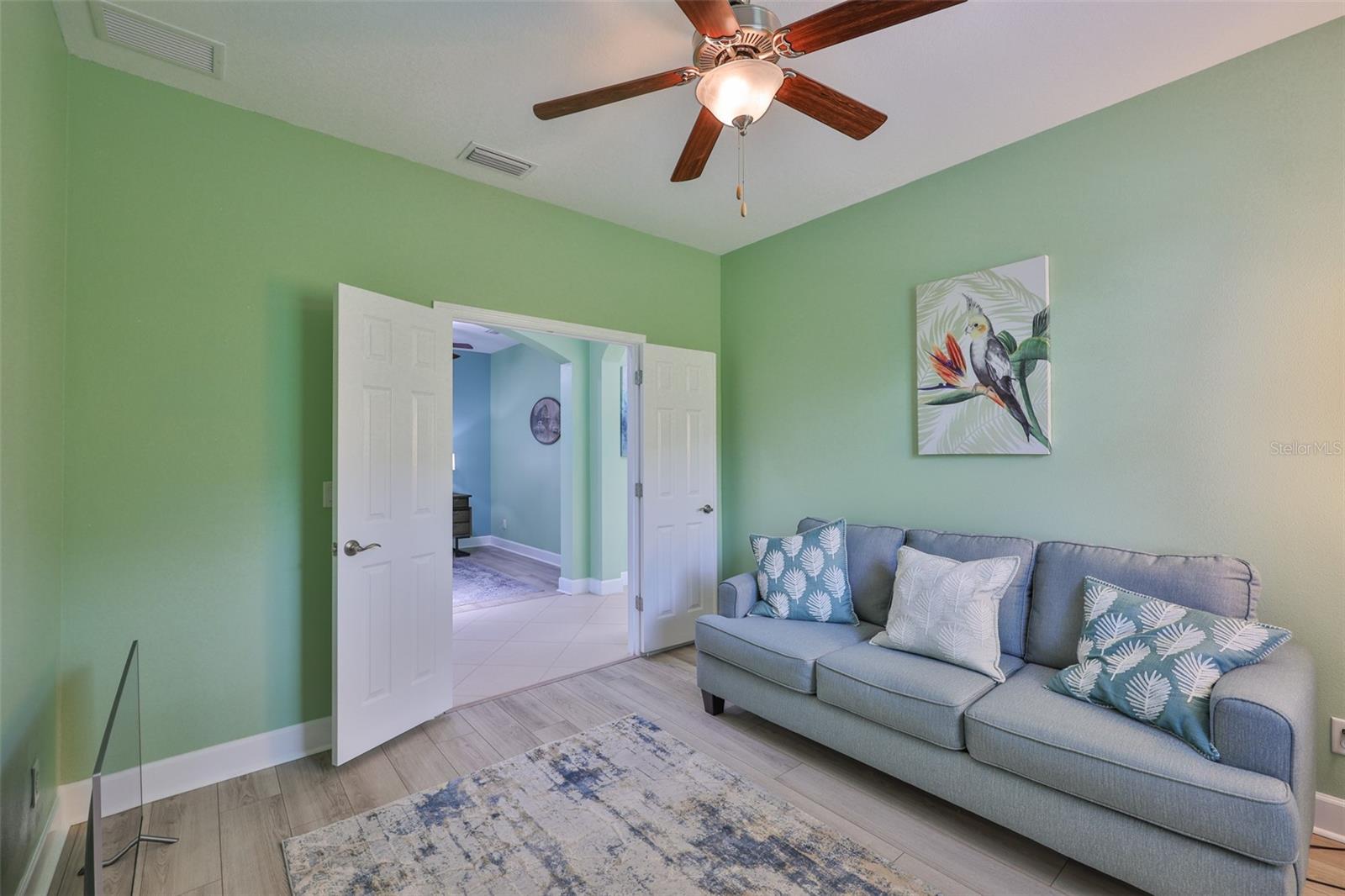 Again the plank flooring is consistent with the rest of the home and the double doors allow for privacy, if desired.