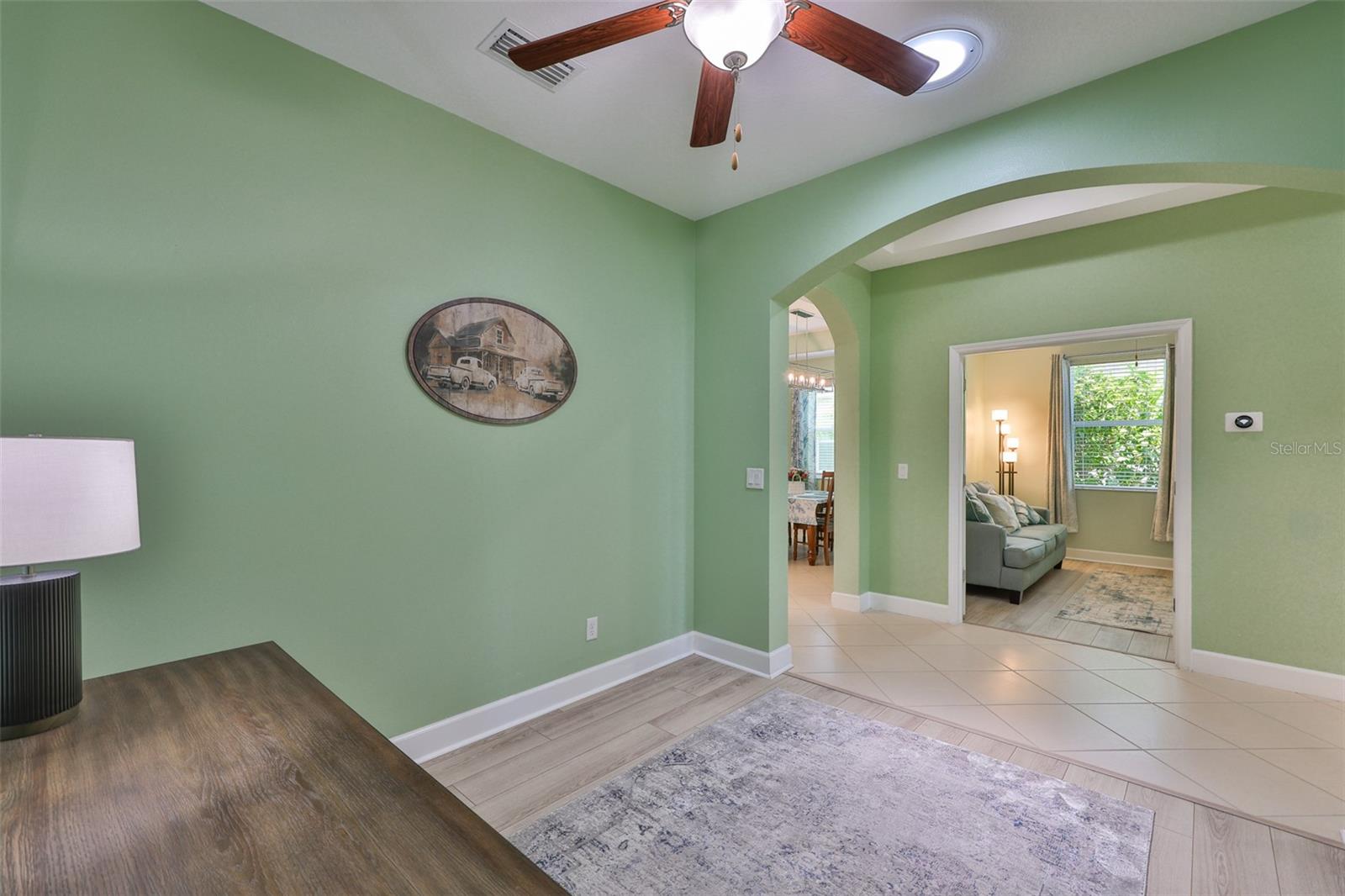 Office/Den is opposite Bedroom #3 and has a nice arched entrance for character.
