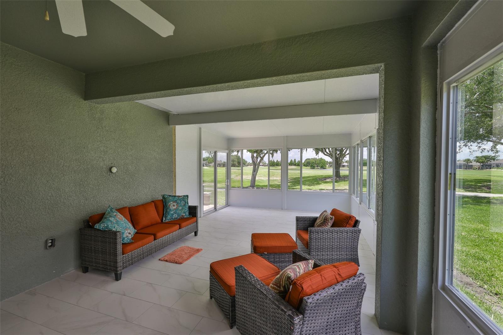 Only one of its kind, in this community! BRAND NEW Florida room with double pane sliding windows for ALL SEASON enjoyment.  This room overlooks the Renaissance Golf course and water.
