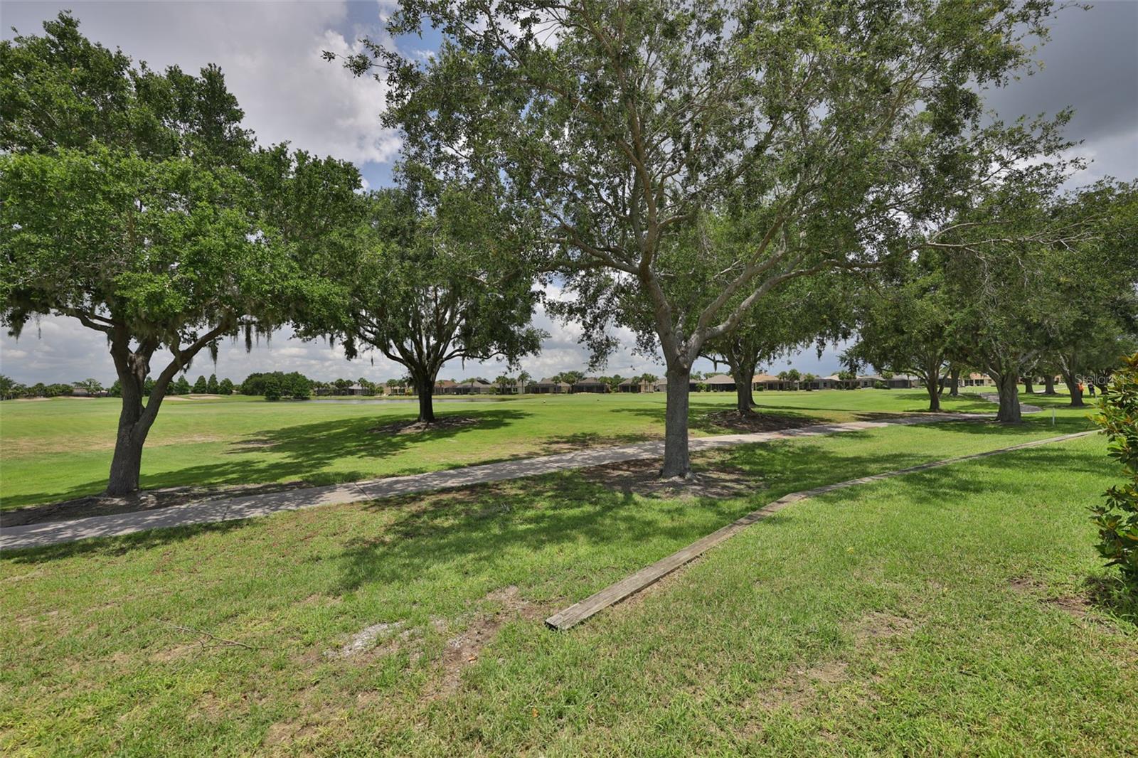 Back yard view with golf trail directly on the very active Renaissance Golf Course.